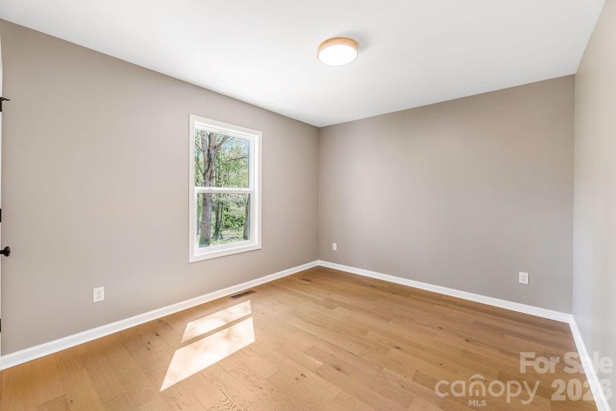 Spacious, unfurnished interior of a new home in , Waynesville (Image 31).