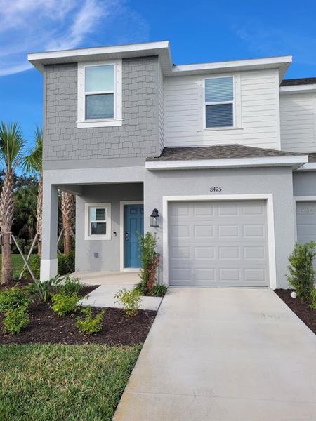 Front exterior of a new home in , Sarasota, FL, highlighting curb appeal (Image 2). Front exterior of a new home in , Sarasota, FL, highlighting curb appeal (Image 2).