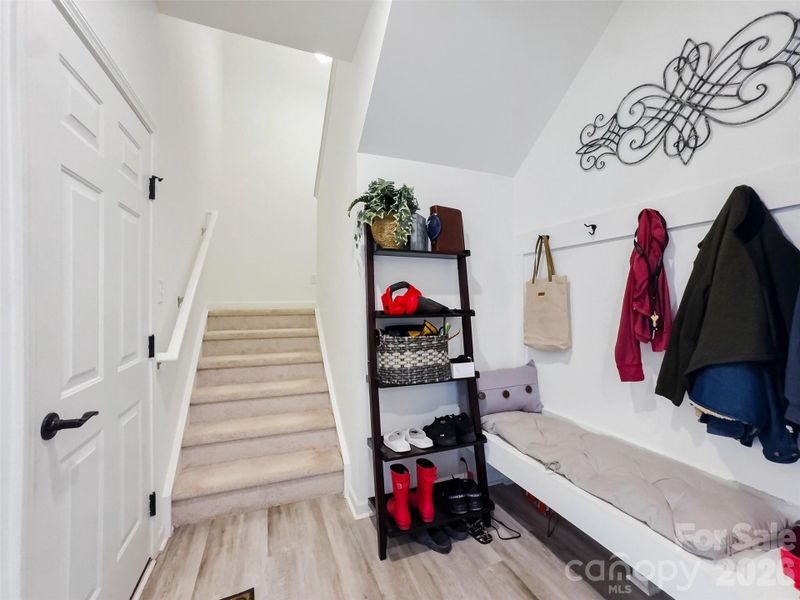 Drop zone off the garage and stairs to the 2nd floor