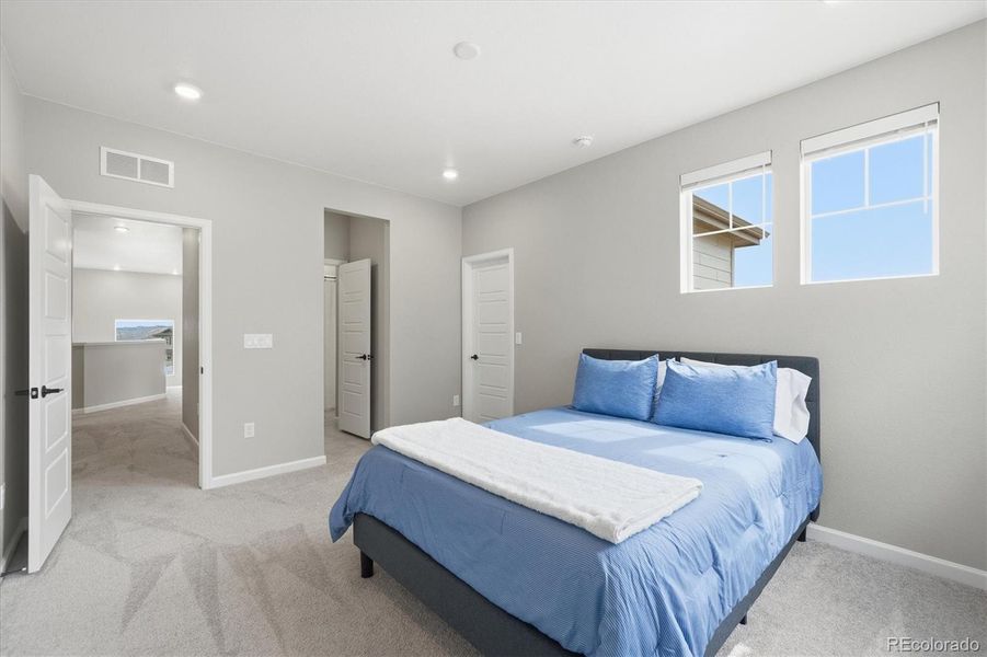 Bedroom #4 with a walk in closet and entry into the other side of the Jack and Jill bathroom.