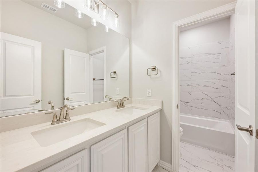 Furnished interior view inside a new home in Union Park Classic 55, Little Elm (Image 8). Furnished interior view inside a new home in Union Park Classic 55, Little Elm (Image 8).