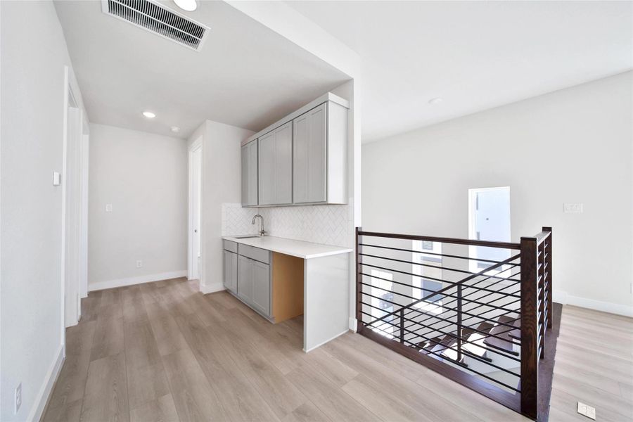 Furnished interior view inside a new home in Lago Pointe, Seabrook (Image 10).