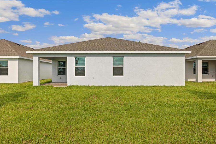 Exterior details and patio area of a home in Coral Lakes - Tradition & Express, Punta Gorda (Image 2). Exterior details and patio area of a home in Coral Lakes - Tradition & Express, Punta Gorda (Image 2).