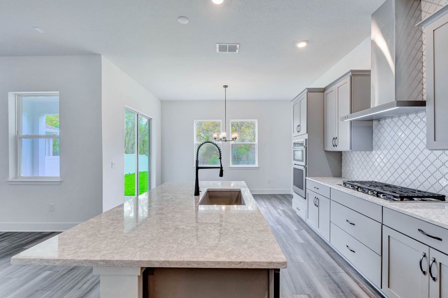 Representative furnished interior of a home built from the Faulkner by Rockwell Homes in Northlake At Ovation, Winter Garden (Image 11).