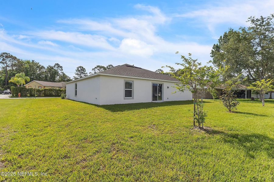 Exterior details and patio area of a home in Palm Coast, Palm Coast (Image 3).