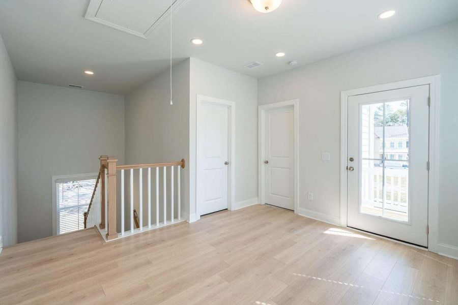 Spacious, unfurnished interior of a new home in Sweetgrass Station, Summerville (Image 29).