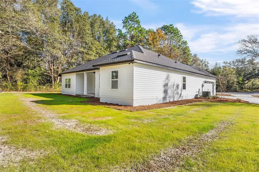 Exterior details and patio area of a home in , Lake City (Image 20). Exterior details and patio area of a home in , Lake City (Image 20).