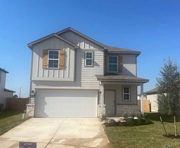 Front exterior of a new home in Laurel Farms, Fulshear, TX, highlighting curb appeal (Image 4).