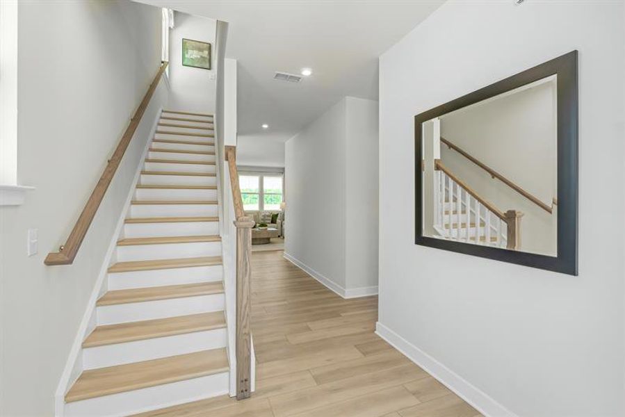 Representative unfurnished interior of a home built from the Charles by Ryan Homes in East Lake, Leland (Image 19). Representative unfurnished interior of a home built from the Charles by Ryan Homes in East Lake, Leland (Image 19).
