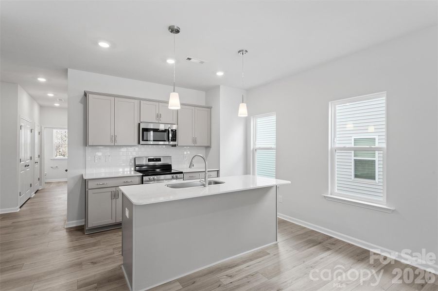 Furnished interior view inside a new home in Sloan Station, Charlotte (Image 4).