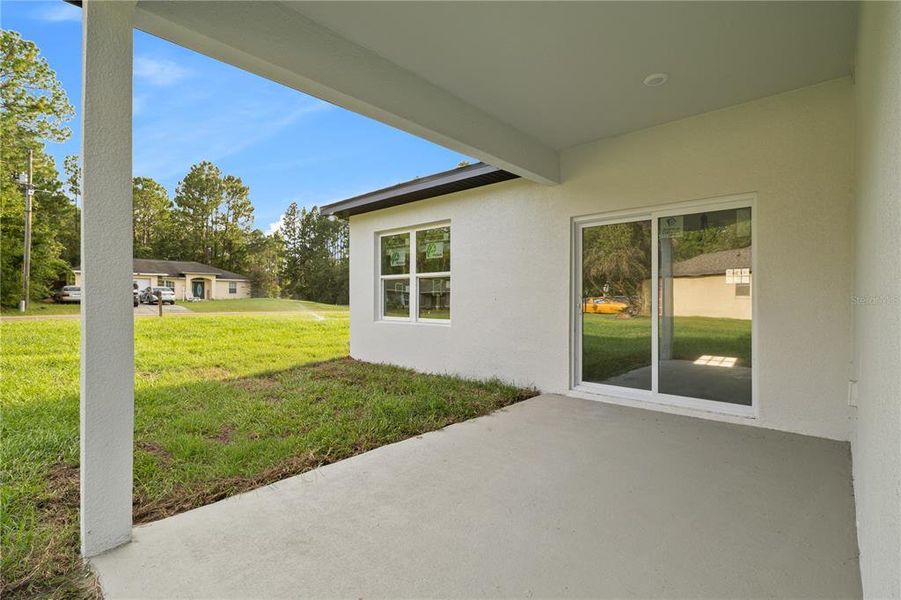 Exterior details and patio area of a home in , Ocala (Image 24).