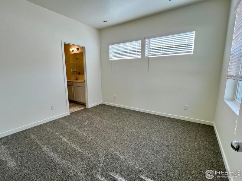 Spacious, unfurnished interior of a new home in Union Colony West, Greeley (Image 13).