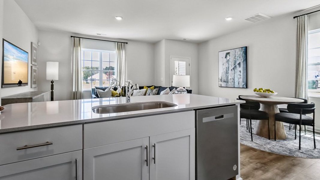 Furnished interior view inside a new home in The Townes at Prestleigh, Wake Forest (Image 8). Furnished interior view inside a new home in The Townes at Prestleigh, Wake Forest (Image 8).