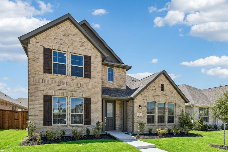 Front exterior of a new home in Dove Hollow, Waxahachie, TX, highlighting curb appeal (Image 23).