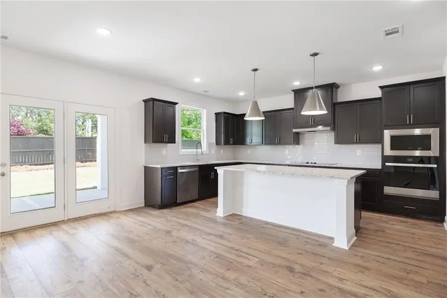 Furnished interior view inside a new home in , Buford (Image 12).