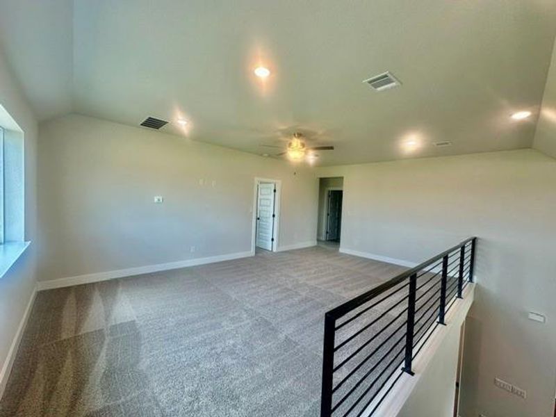 A spacious, naturally illuminated bonus room awaits, offering versatile living options. A spacious, naturally illuminated bonus room awaits, offering versatile living options.