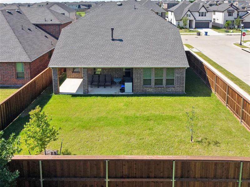 Exterior details and patio area of a home in , Little Elm (Image 25). Exterior details and patio area of a home in , Little Elm (Image 25).