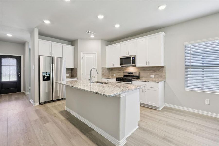 Furnished interior view inside a new home in Westmoor, Sherman (Image 10).