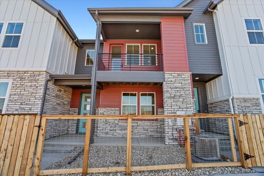 Front exterior of a new home in Arras Park, Thornton, CO, highlighting curb appeal (Image 2).