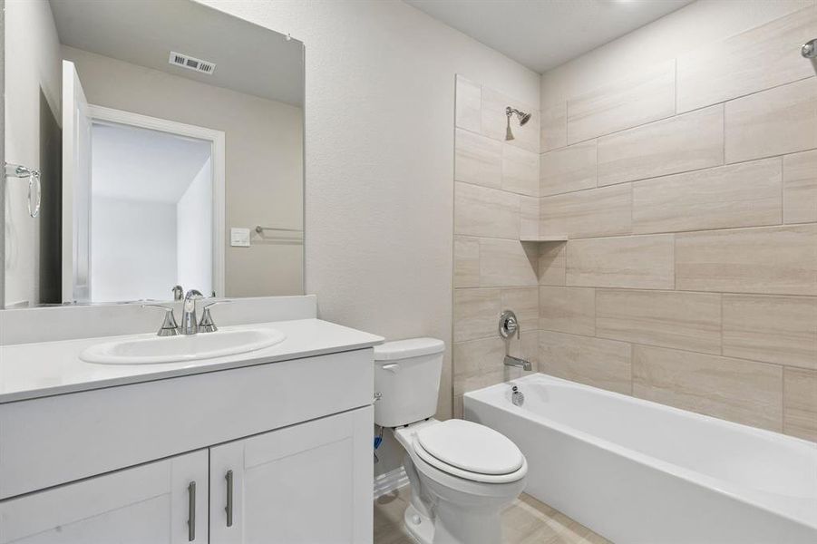 Furnished interior view inside a new home in Parks at Foster Crossing - Signature Series, Anna (Image 12).