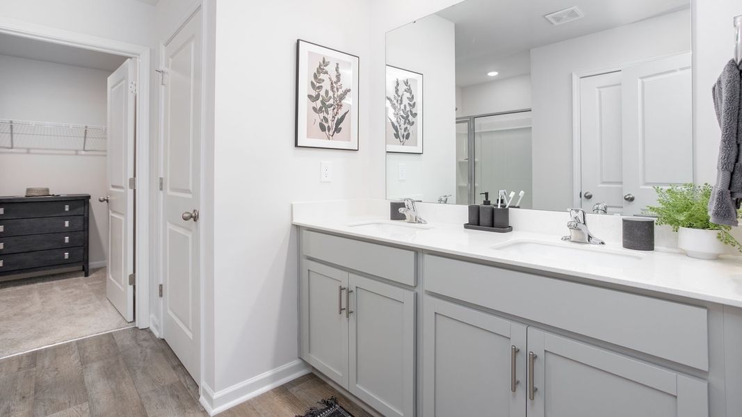 Representative furnished interior of a home built from the PENWELL by D.R. Horton in Preston Oaks, King (Image 12).