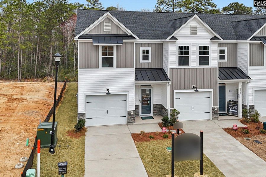 Front exterior of a new home in Victory Woods, Columbia, SC, highlighting curb appeal (Image 28). Front exterior of a new home in Victory Woods, Columbia, SC, highlighting curb appeal (Image 28).