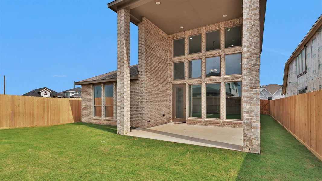 Exterior details and patio area of a home in Harvest Green, Richmond (Image 9).