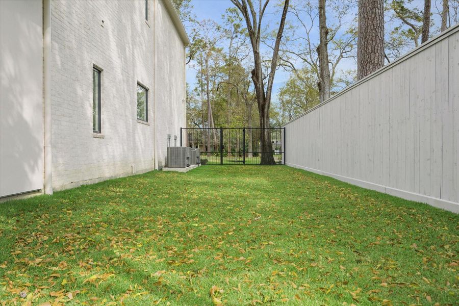 Exterior details and patio area of a home in , Houston (Image 27).