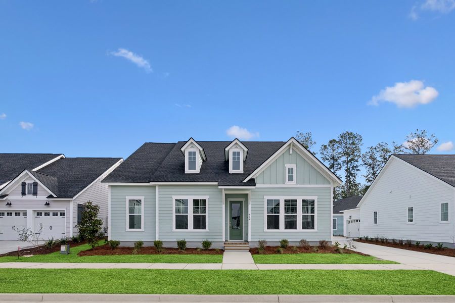 Front exterior of a new home in Nexton – Midtown – The Garden Collection, Summerville, SC, highlighting curb appeal (Image 1). Front exterior of a new home in Nexton – Midtown – The Garden Collection, Summerville, SC, highlighting curb appeal (Image 1).