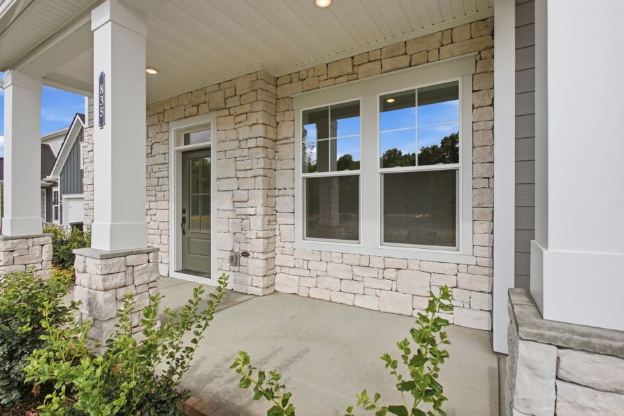 Exterior details and patio area of a home in Heritage Green – The Signature Collection, Columbia (Image 4). Exterior details and patio area of a home in Heritage Green – The Signature Collection, Columbia (Image 4).