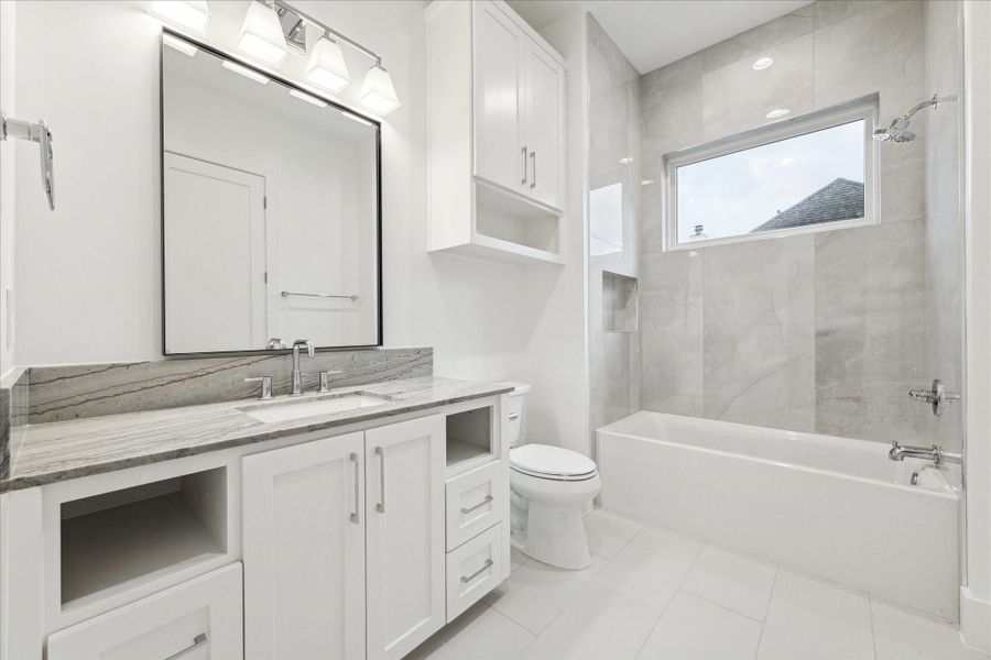 One of 4 secondary bathrooms - all with marble counters One of 4 secondary bathrooms - all with marble counters