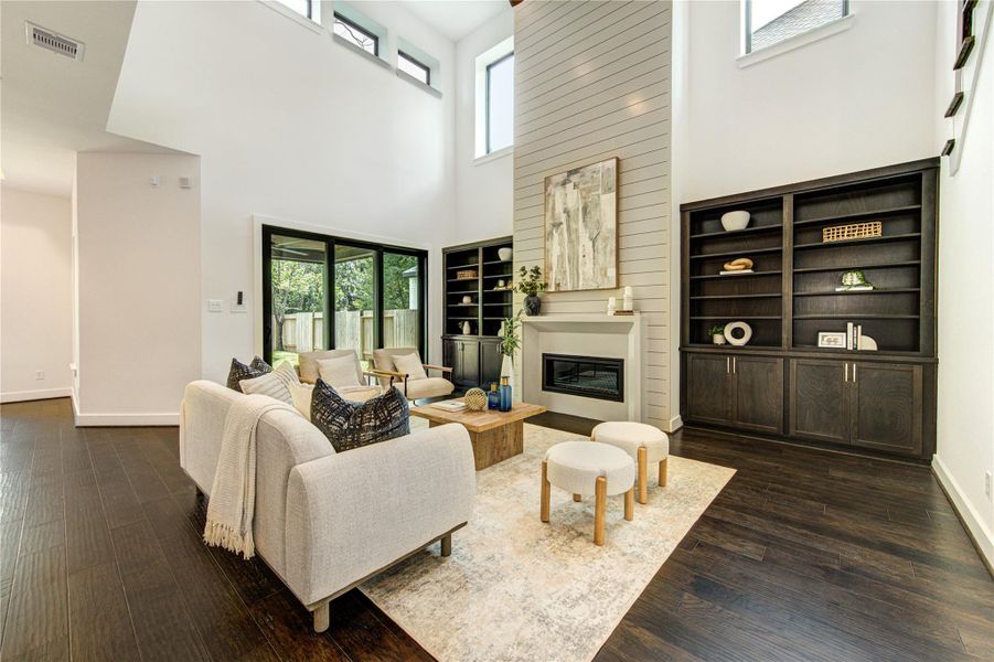 custom built-ins to make the living room warm and welcoming custom built-ins to make the living room warm and welcoming