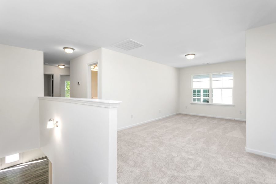 Furnished interior in a model home at Miller's Reserve in Winston-Salem (Image 24).