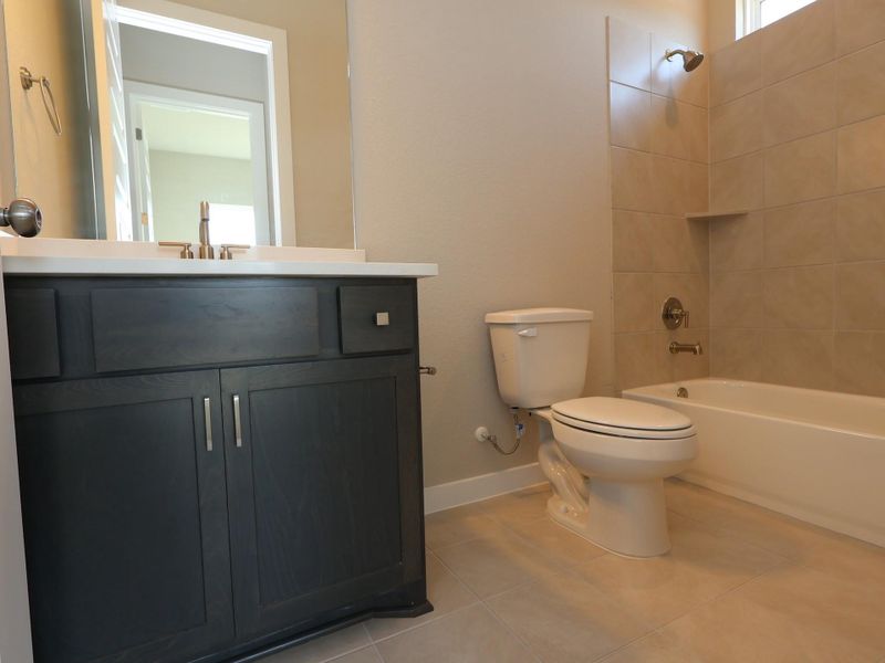 Furnished interior view inside a new home in Cedar Brook, Leander (Image 6).