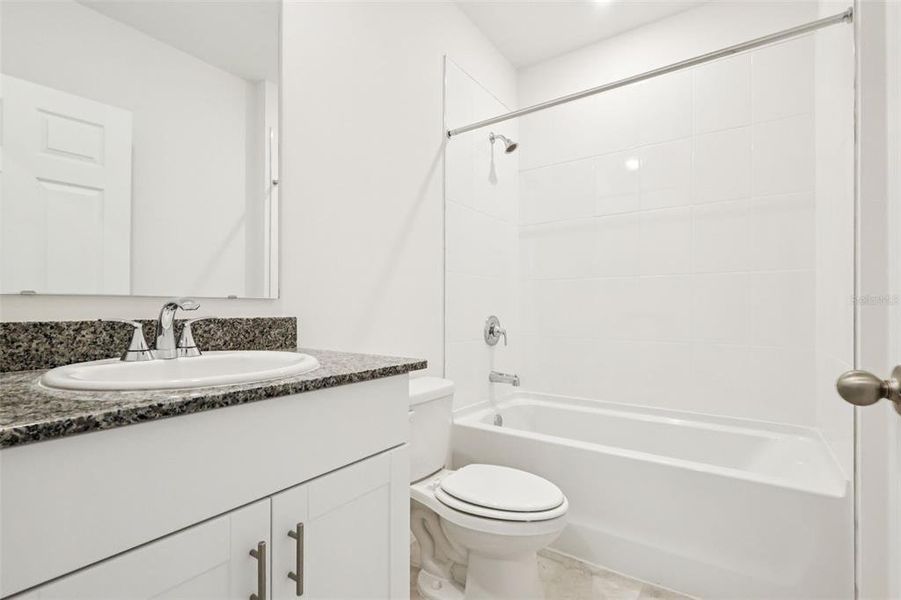 Furnished interior view inside a new home in , Poinciana (Image 11).