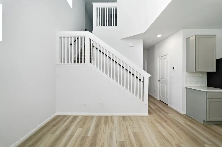 Spacious, unfurnished interior of a new home in Municipal Drive Townhomes, Leander (Image 27). Spacious, unfurnished interior of a new home in Municipal Drive Townhomes, Leander (Image 27).