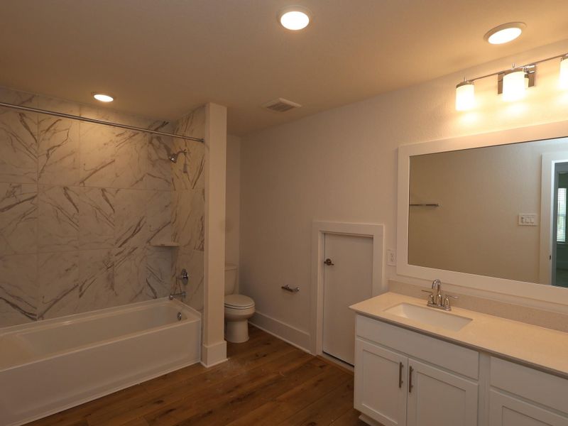 Furnished interior view inside a new home in Sorella, Tomball (Image 7).