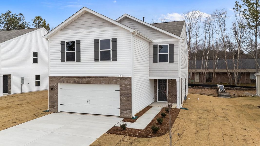 Front exterior of a new home in Hunter Hill, Rocky Mount, NC, highlighting curb appeal (Image 17).
