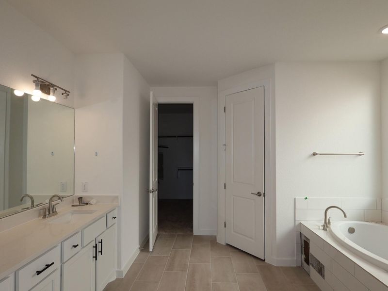 Furnished interior view inside a new home in Edgewood, Leander (Image 6). Furnished interior view inside a new home in Edgewood, Leander (Image 6).