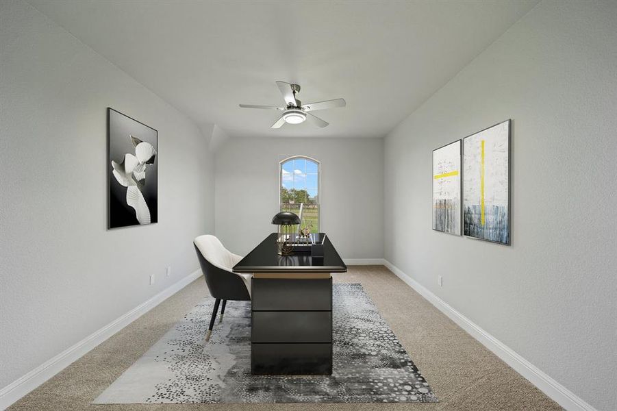 Carpeted office space with ceiling fan