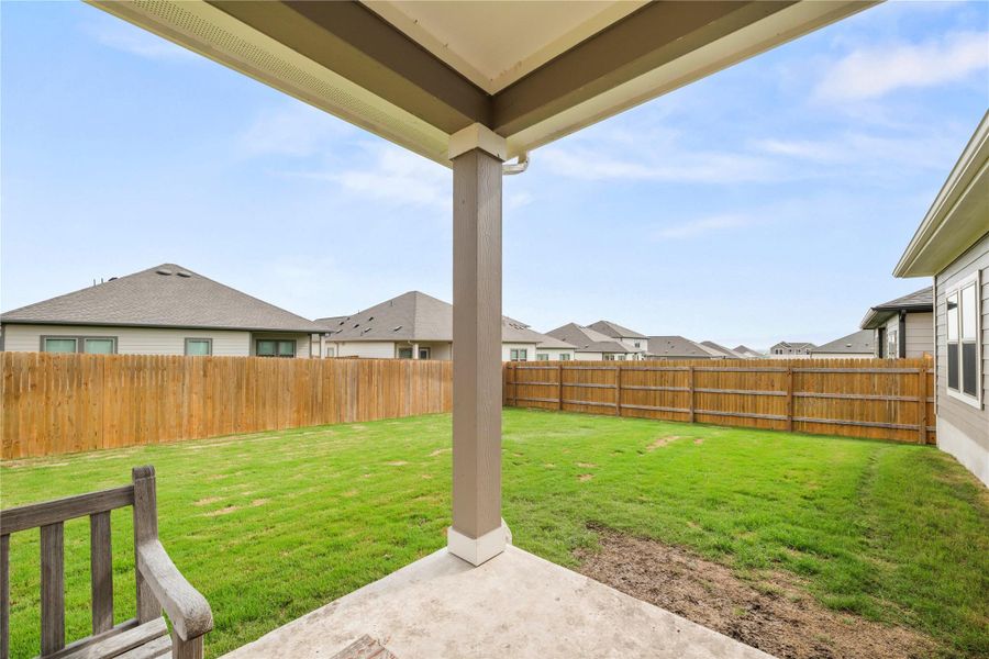 A spacious, enclosed backyard offers a serene private retreat perfect for outdoor living. A spacious, enclosed backyard offers a serene private retreat perfect for outdoor living.