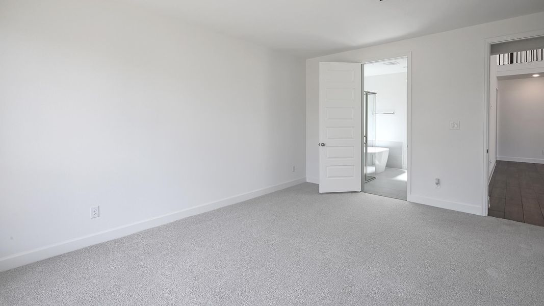 Spacious, unfurnished interior of a new home in 6 Creeks, Kyle (Image 19).