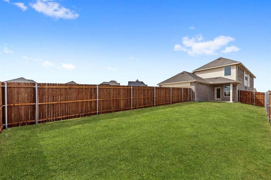 Exterior details and patio area of a home in Edgewater, Fate (Image 3). Exterior details and patio area of a home in Edgewater, Fate (Image 3).