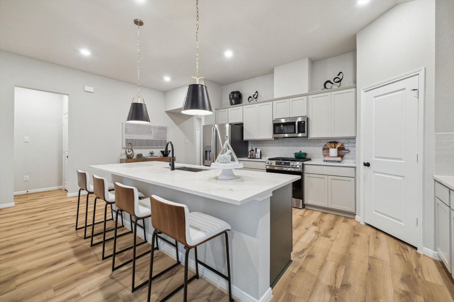 Representative furnished interior of a home built from the Harding by Autograph Homes in Sundance Cove, Crosby (Image 9).