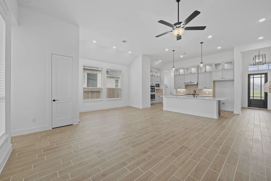 Representative unfurnished interior of a home built from the Summerton by Chesmar Homes in University Heights, Round Rock (Image 23).