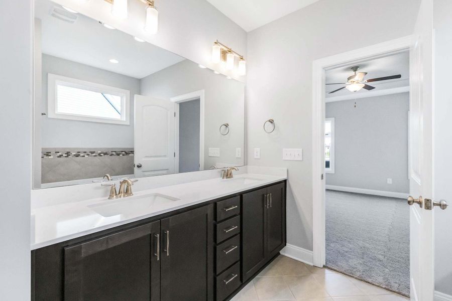 Representative furnished interior of a home built from the Clayton by Caviness & Cates Communities in Bartlett Manor, Youngsville (Image 185).