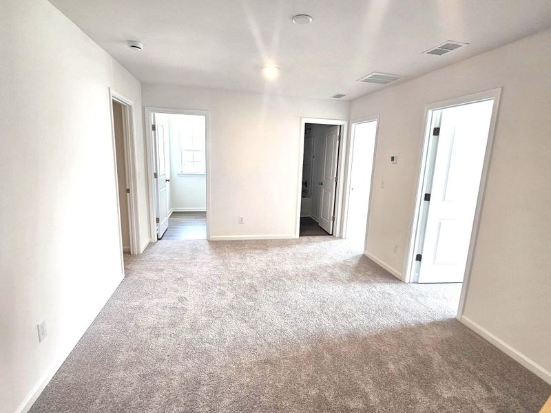 Spacious, unfurnished interior of a new home in Creekside at Andrews, Summerville (Image 9).