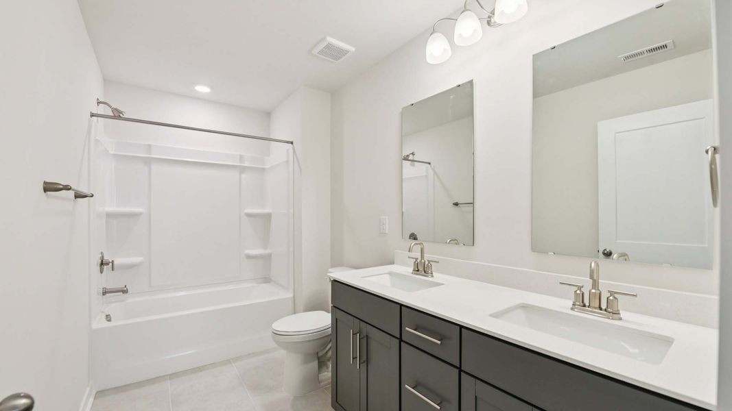Representative furnished interior of a home built from the Adams by D.R. Horton in Oak Grove Hill, Huntersville (Image 8).