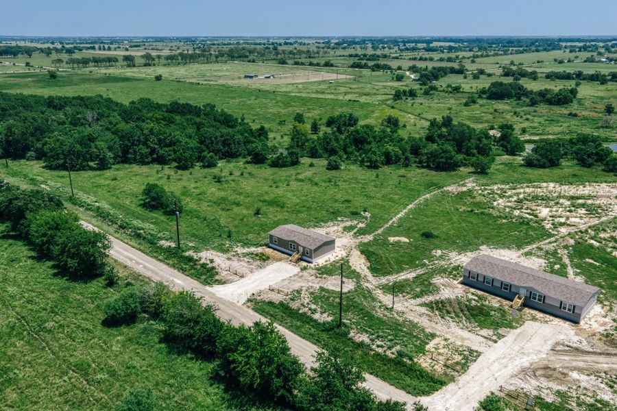Aerial view of both model homes Aerial view of both model homes
