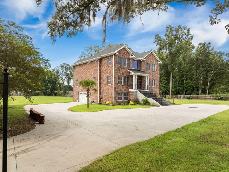 Front exterior of a new home in , Summerville, SC, highlighting curb appeal (Image 26). Front exterior of a new home in , Summerville, SC, highlighting curb appeal (Image 26).